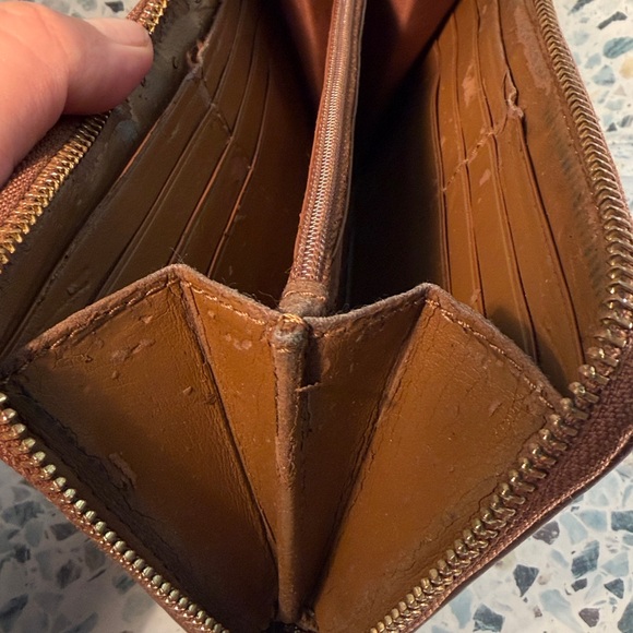 Coach Tan and Brown Signature Zip Wallet
PROJECT - Picture 8 of 9